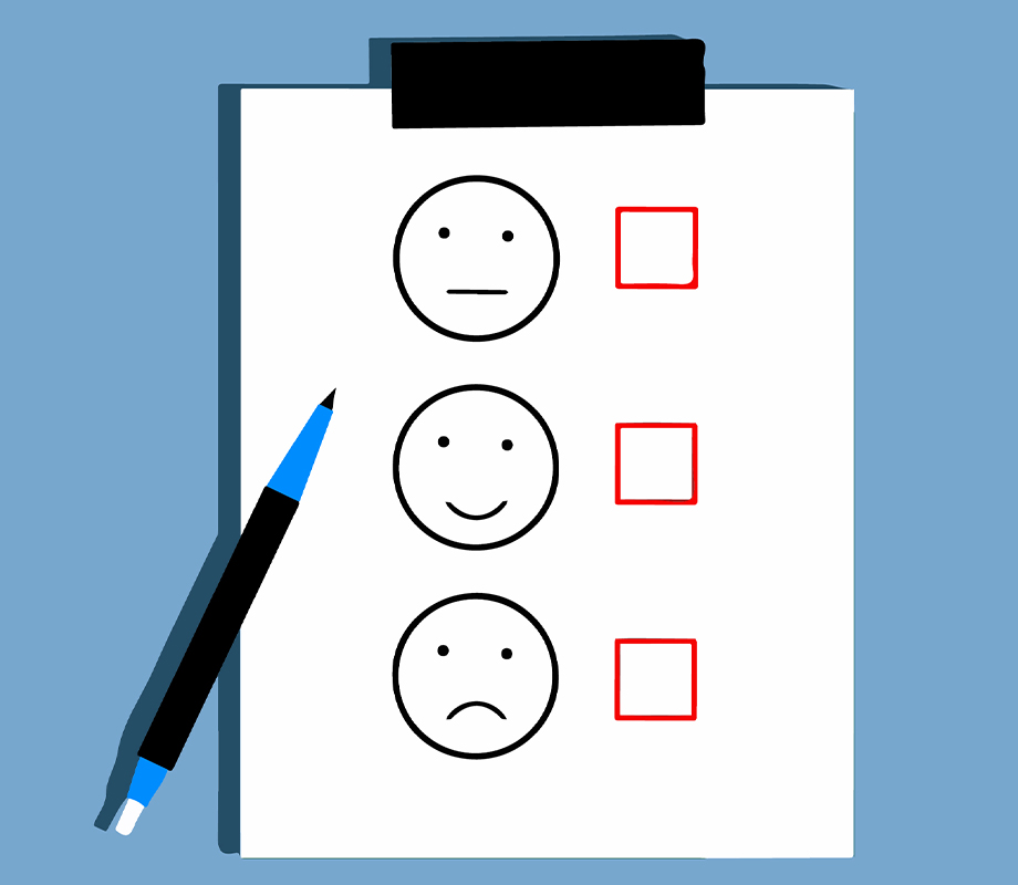 Papierbogen mit drei Smileys unterschiedlicher Stimmung und Checkboxen zum Ankreuzen
